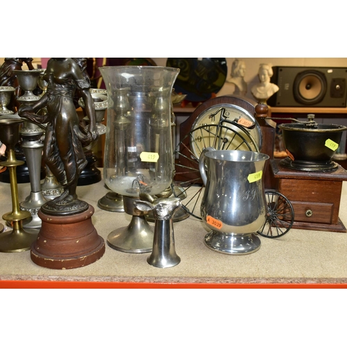 419 - A QUANTITY OF METALWARES, CLOCKS AND CANDELABRA, comprising a brass oil lamp with foliate design bra... 