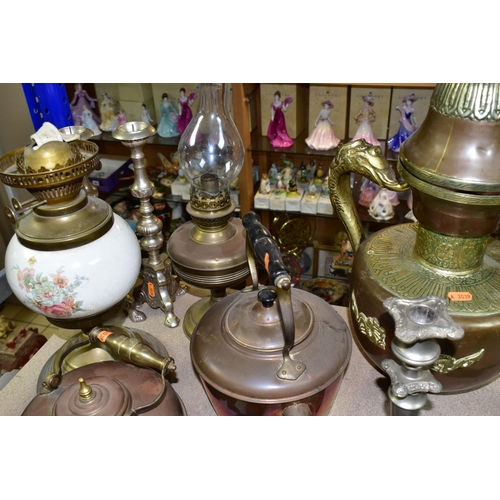 419 - A QUANTITY OF METALWARES, CLOCKS AND CANDELABRA, comprising a brass oil lamp with foliate design bra... 