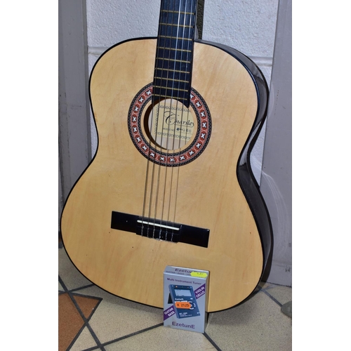 439 - A CHARSLEY CHILDREN'S CLASSICAL GUITAR model number W360  together with a boxed EzetunE guitar tuner... 