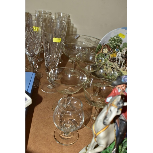 468 - A QUANTITY OF DRINKING GLASSES, comprising  a set of seventeen Stuart Crystal champagne glasses, a p... 