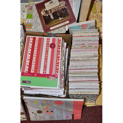 479 - THIRTEEN BOXES OF CRAFT PAPERS, STICKERS AND STENCILS, to include craft papers in 12x12'', 8x8'', 6x... 