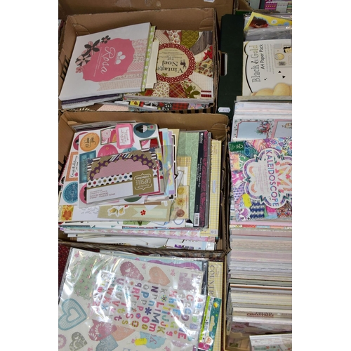 479 - THIRTEEN BOXES OF CRAFT PAPERS, STICKERS AND STENCILS, to include craft papers in 12x12'', 8x8'', 6x... 