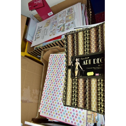 479 - THIRTEEN BOXES OF CRAFT PAPERS, STICKERS AND STENCILS, to include craft papers in 12x12'', 8x8'', 6x... 