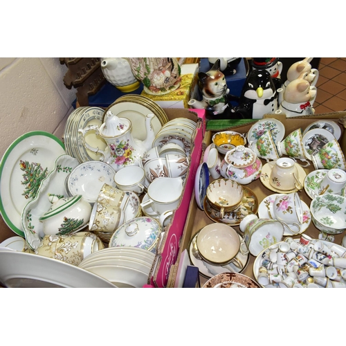 499 - TWO BOXES OF TEAWARES to include eight novelty teapots, a collection of thimbles with a display shel... 