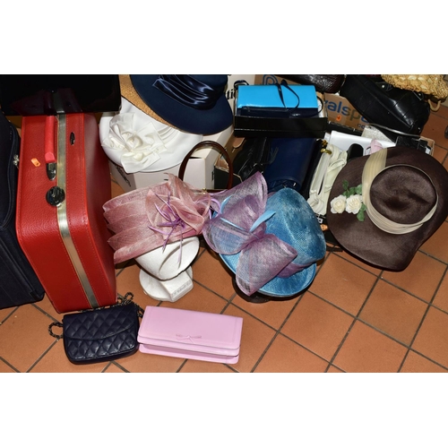 574 - TWO BOXES OF HANDBAGS, HATS & BOXES TOGETHER WITH TWO SUITCASES, to include a small red Antler suitc... 