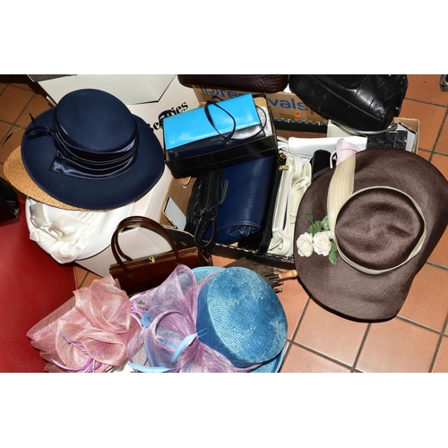 574 - TWO BOXES OF HANDBAGS, HATS & BOXES TOGETHER WITH TWO SUITCASES, to include a small red Antler suitc... 