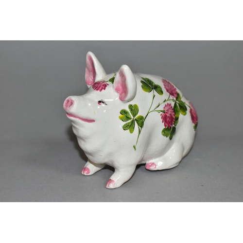 351 - AN EXON WEMYSS PIG, painted with pink clover by Brian Adams, green painted marks to base 'Wemyss Exo... 