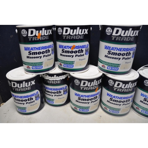 1071 - ELEVEN TINS OF MASONARY PAINT comprising seven tins of Dulux magnolia masonry paint and four tins of... 