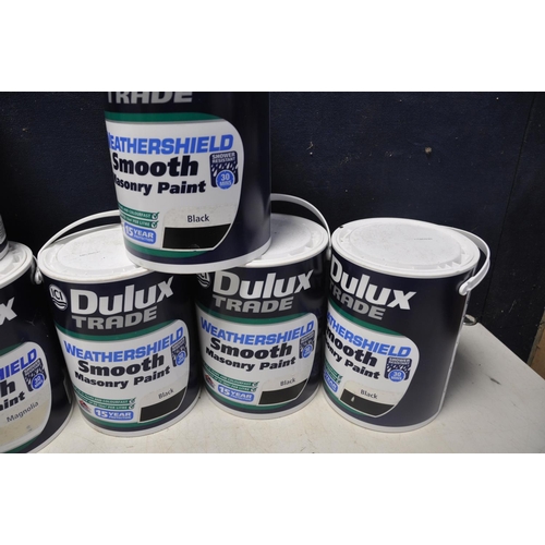 1071 - ELEVEN TINS OF MASONARY PAINT comprising seven tins of Dulux magnolia masonry paint and four tins of... 