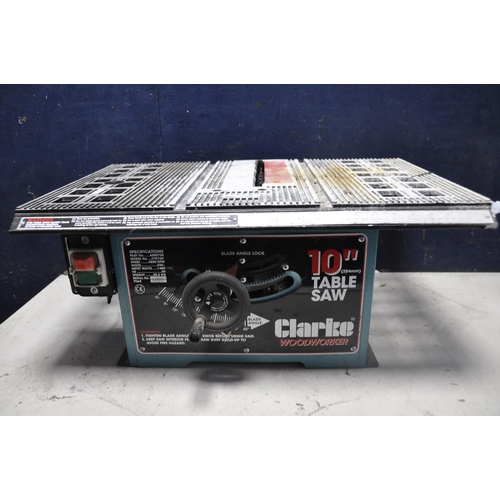 1091 - A CLARKE CTS10C TABLE SAW with blade (UNTESTED) along with a Workzone PLU9182 extending work stand (... 