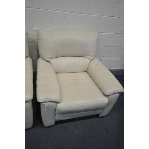 1318 - A CREAM LEATHERETTE TWO PIECE LOUNGE SUITE, comprising a two seater sofa, length 144cm x depth 100cm... 