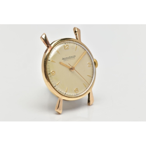 12 - A YELLOW METAL JAEGER-LE COULTRE WATCH HEAD, the champagne colour circular dial, with Arabic quarter... 