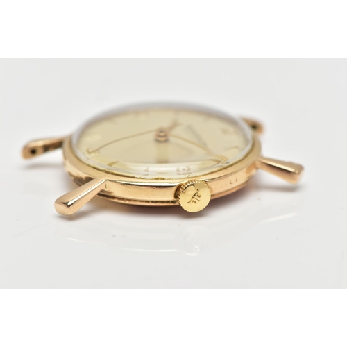 12 - A YELLOW METAL JAEGER-LE COULTRE WATCH HEAD, the champagne colour circular dial, with Arabic quarter... 