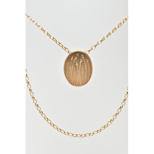 25 - A 9CT GOLD PENDANT WITH 9CT GOLD CHAIN, the oval embossed pendant, suspended from a trace link chain... 