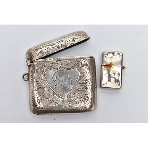 61 - A SILVER VESTA AND WHITE METAL LIGHTER, foliage engraving and monogram engrave cartouche, hinged lid... 