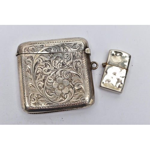 61 - A SILVER VESTA AND WHITE METAL LIGHTER, foliage engraving and monogram engrave cartouche, hinged lid... 