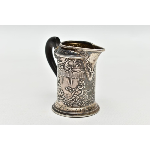 65 - AN EARLY 20TH CENTURY SILVER MILK JUG, of continental design, depicting mythical creatures/cherubs, ... 