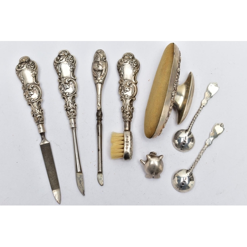 67 - AN ASSORTMENT OF SILVER AND WHITE METAL ITEMS, to include a three part silver handled manicure set, ... 