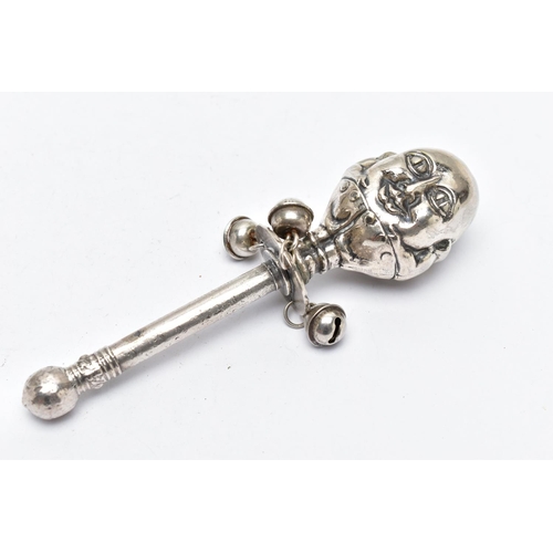 71 - A MID 19TH CENTURY WHITE METAL BABY RATTLE, depicting a character to the top, suspending three jingl... 