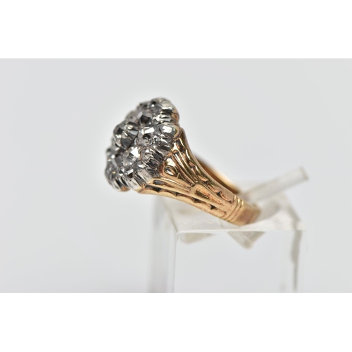 1 - A GEORGIAN DIAMOND CLUSTER RING, set with a principal old mine cut diamond, measuring approximately ... 