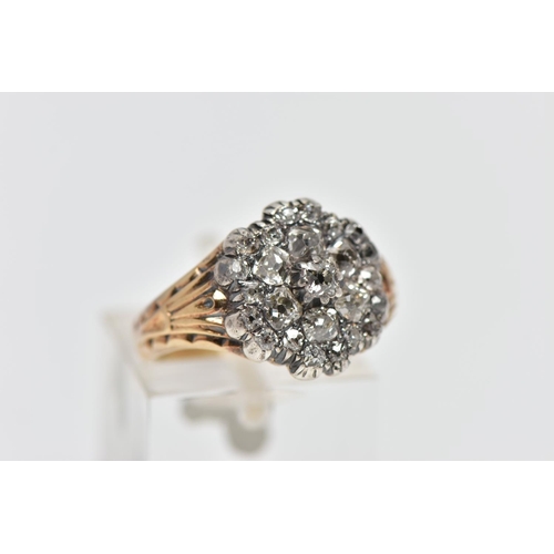 1 - A GEORGIAN DIAMOND CLUSTER RING, set with a principal old mine cut diamond, measuring approximately ... 