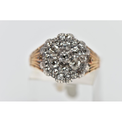 1 - A GEORGIAN DIAMOND CLUSTER RING, set with a principal old mine cut diamond, measuring approximately ... 