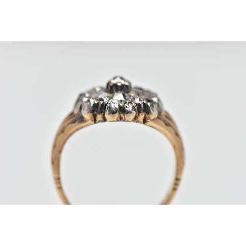 1 - A GEORGIAN DIAMOND CLUSTER RING, set with a principal old mine cut diamond, measuring approximately ... 