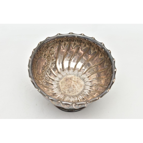 102 - AN EDWARDIAN SILVER ROSE BOWL, wavy rim over wrythen and foliate repousse decoration, vacant cartouc... 