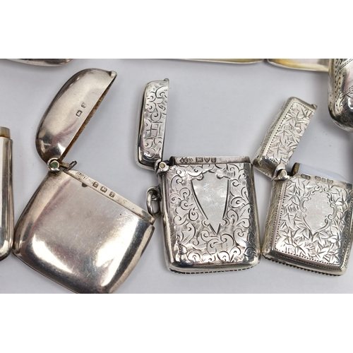 107 - FIVE EDWARDIAN AND GEORGE V SILVER VESTA CASES, A SILVER MATCHBOOK SLEEVE AND AN IMPORTED STERLING S... 