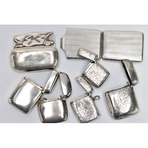 107 - FIVE EDWARDIAN AND GEORGE V SILVER VESTA CASES, A SILVER MATCHBOOK SLEEVE AND AN IMPORTED STERLING S... 