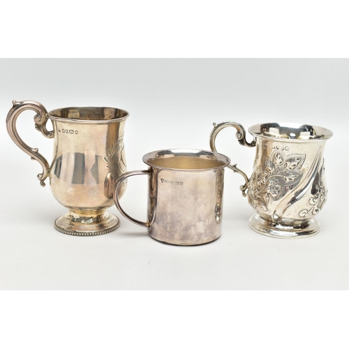 108 - TWO VICTORIAN SILVER CHRISTENING MUGS AND AN ELIZABETH II SILVER CHRISTENING MUG, comprising a repou... 