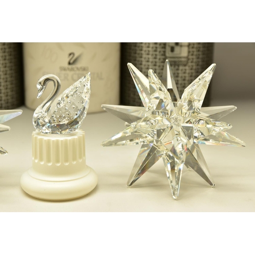 141 - TWO BOXED SWAROVSKI CRYSTAL 143L STAR CANDLEHOLDERS  (013748), 1987 retired 1996, height 11cm x widt... 