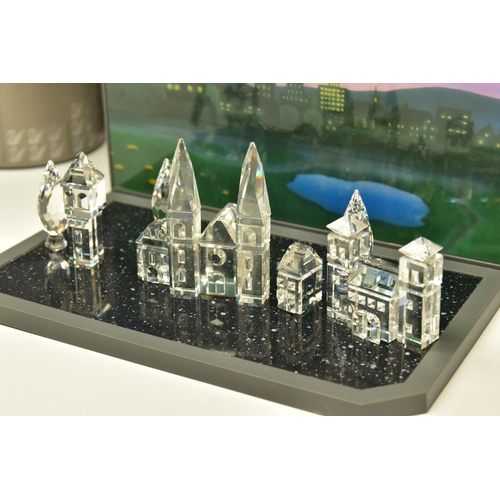 155 - SWAROVSKI CRYSTAL CITY SCENE, comprising boxed Houses Set 1 (158980) 1990, boxed House Set 2 (158981... 