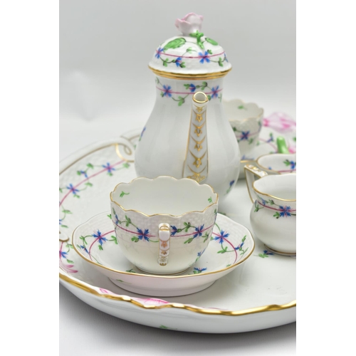 178 - A HEREND PORCELAIN CABARET SET HAND PAINTED WITH STYLISED CORNFLOWERS, the set comprises an oval tra... 