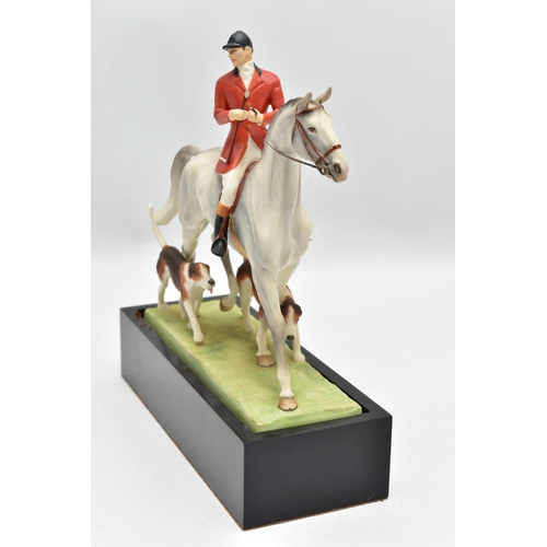 183 - A ROYAL WORCESTER PORCELAIN FIGURE GROUP 'HUNTSMAN AND HOUNDS' MODELLED BY DORIS LINDER, no.3115, da... 