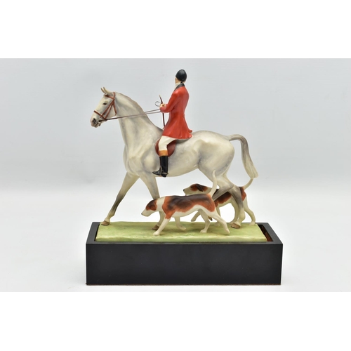 183 - A ROYAL WORCESTER PORCELAIN FIGURE GROUP 'HUNTSMAN AND HOUNDS' MODELLED BY DORIS LINDER, no.3115, da... 