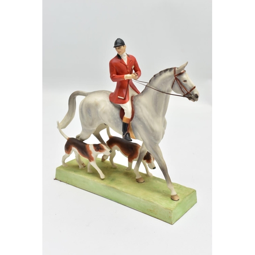 183 - A ROYAL WORCESTER PORCELAIN FIGURE GROUP 'HUNTSMAN AND HOUNDS' MODELLED BY DORIS LINDER, no.3115, da... 