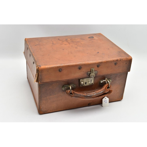 196 - AN EARLY 20TH CENTURY BLICK ALUMINIUM FEATHERWEIGHT TYPEWRITER IN A TAN LEATHER COVERED CASE, the re... 