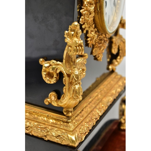 216 - A LATE 19TH CENTURY BLACK SLATE AND GILT METAL CHARLES FRODSHAM OF PARIS MANTEL CLOCK UNDER A GLASS ... 