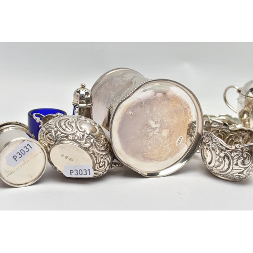 22 - A GROUP OF SILVER, comprising a Victorian silver mug of conical form, cast foliate handle, the body ... 