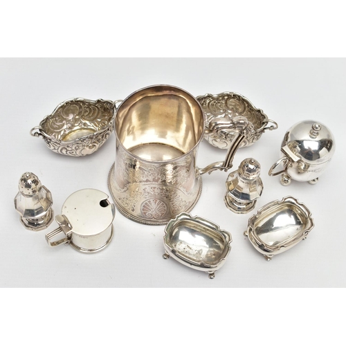 22 - A GROUP OF SILVER, comprising a Victorian silver mug of conical form, cast foliate handle, the body ... 