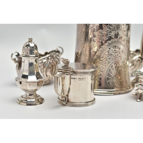 22 - A GROUP OF SILVER, comprising a Victorian silver mug of conical form, cast foliate handle, the body ... 