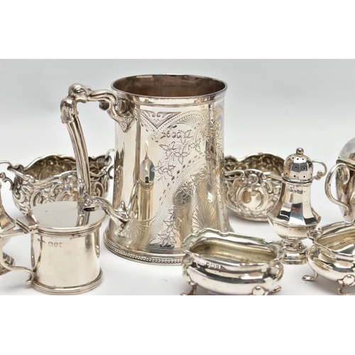 22 - A GROUP OF SILVER, comprising a Victorian silver mug of conical form, cast foliate handle, the body ... 
