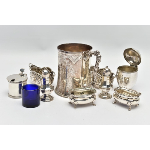 22 - A GROUP OF SILVER, comprising a Victorian silver mug of conical form, cast foliate handle, the body ... 