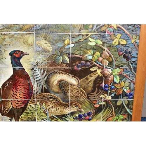 238A - AN EARLY 20TH CENTURY FORTY TWO TILE PANEL HAND PAINTED WITH COCK AND HEN PHEASANTS IN  A WOODLAND C... 