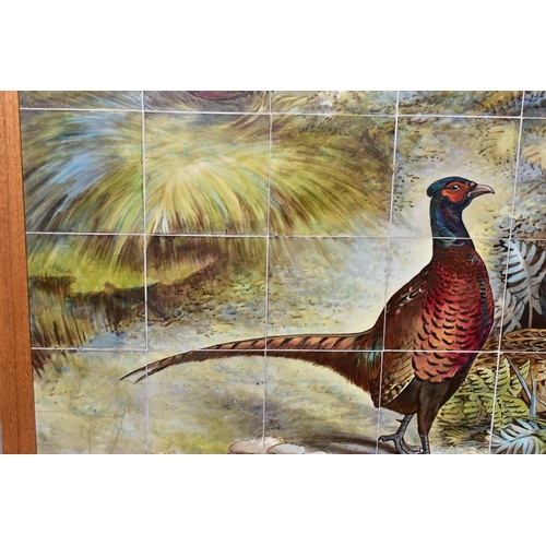 238A - AN EARLY 20TH CENTURY FORTY TWO TILE PANEL HAND PAINTED WITH COCK AND HEN PHEASANTS IN  A WOODLAND C... 