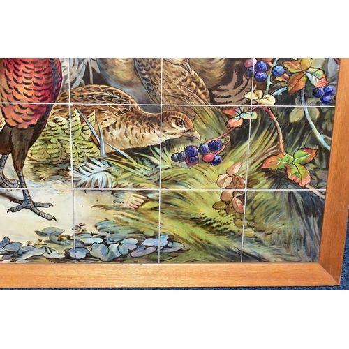 238A - AN EARLY 20TH CENTURY FORTY TWO TILE PANEL HAND PAINTED WITH COCK AND HEN PHEASANTS IN  A WOODLAND C... 