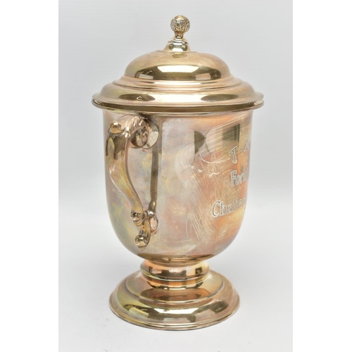 24 - A GEORGE V SILVER TWIN HANDLED TROPHY CUP AND COVER, the pull off domed cover with foliate ball fini... 