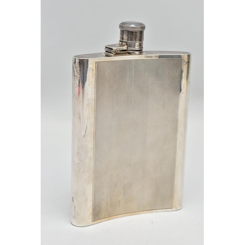 26 - AN ELIZABETH II SILVER HIP FLASK OF BOWED RECTANGULAR FORM, fitted with a hinged bayonet cap with co... 