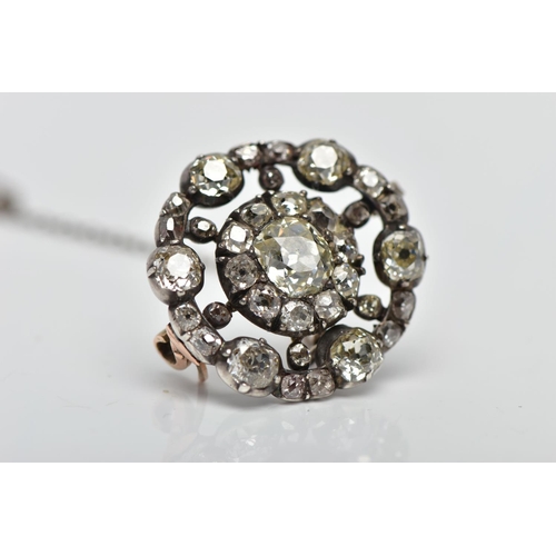 3 - A GEORGIAN DIAMOND CLUSTER BROOCH, set with a principal old European cut diamond, measuring approxim... 